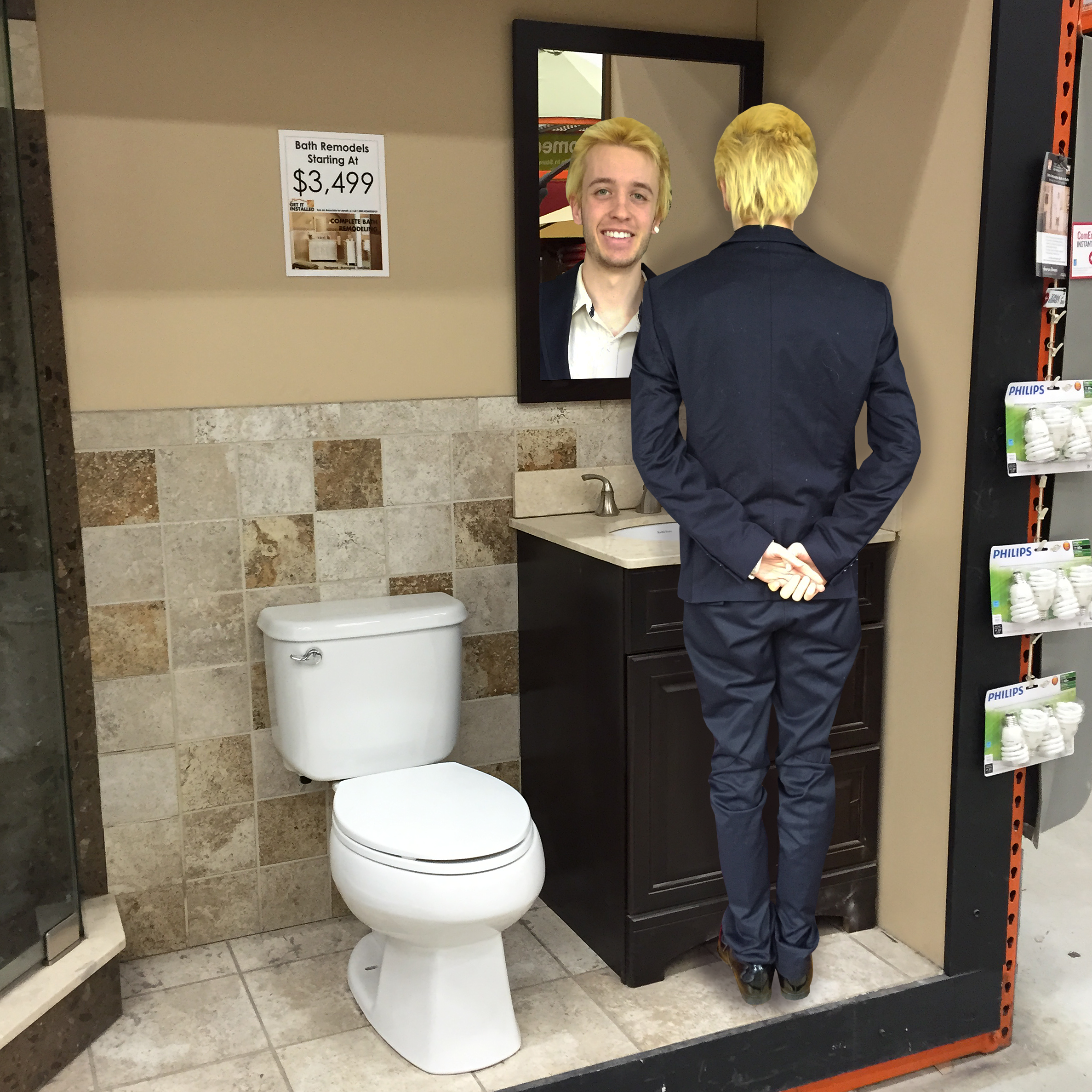Butler facing away from the camera standing in a Home Depot bathroom display